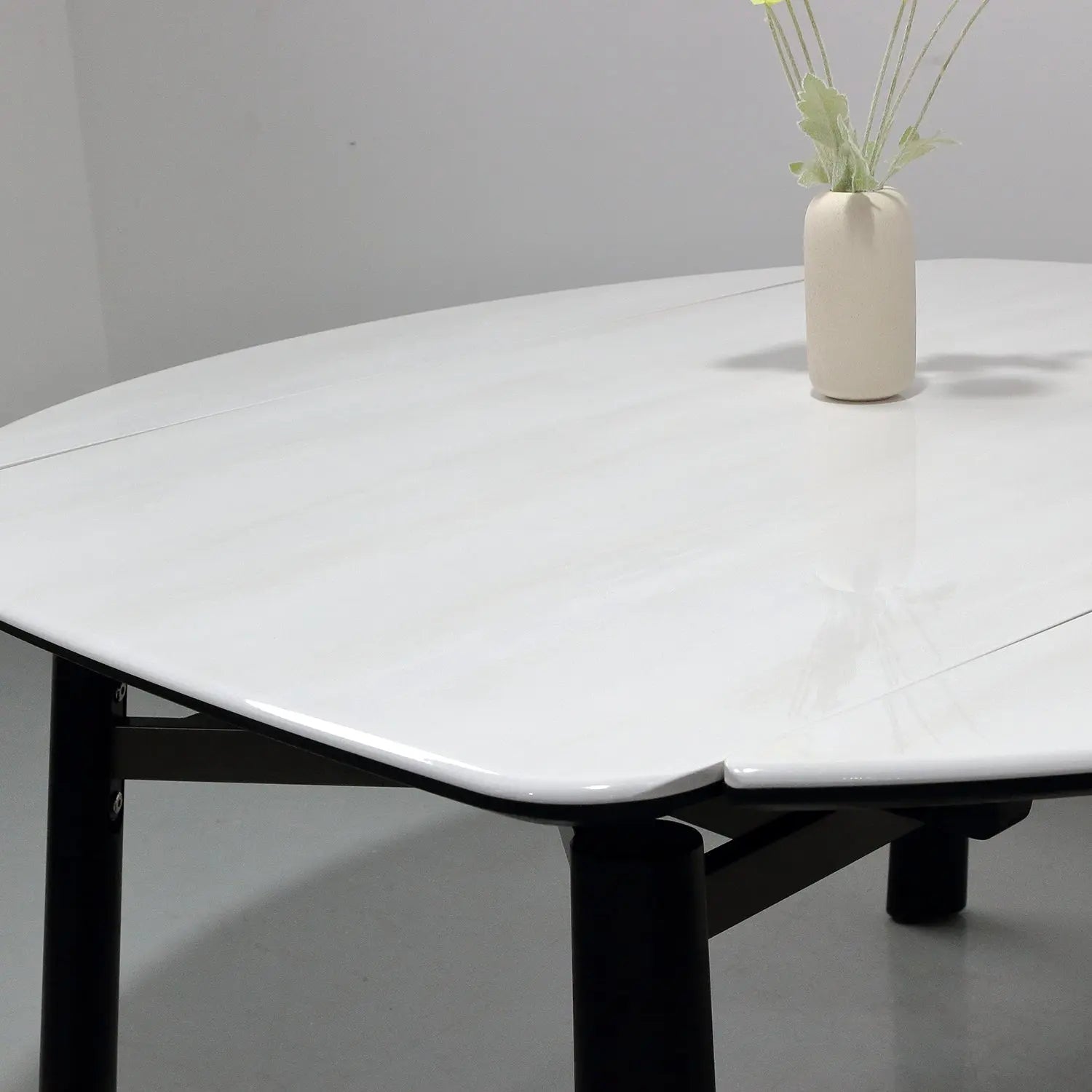 White Microlite Table - Expandable Rectangle to Round with Solid Wood Legs Marsiling